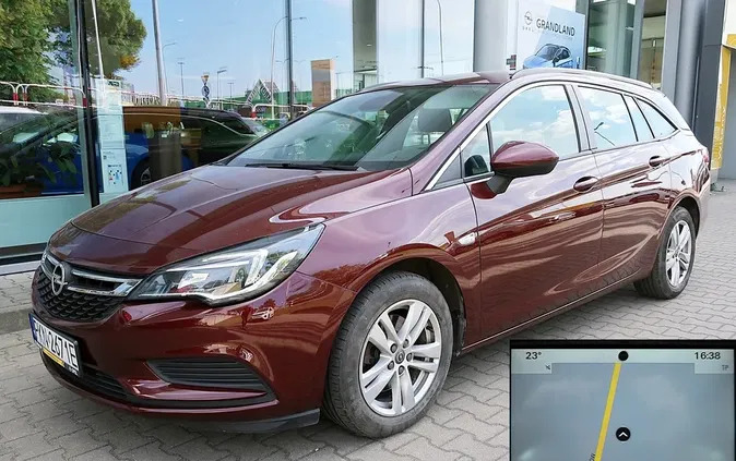 wielkopolskie Opel Astra cena 45900 przebieg: 101500, rok produkcji 2018 z Puszczykowo